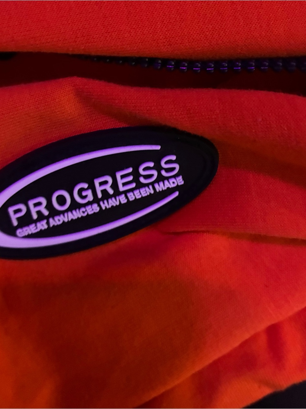 Kids Orange Backpack with Branded Oval Badge